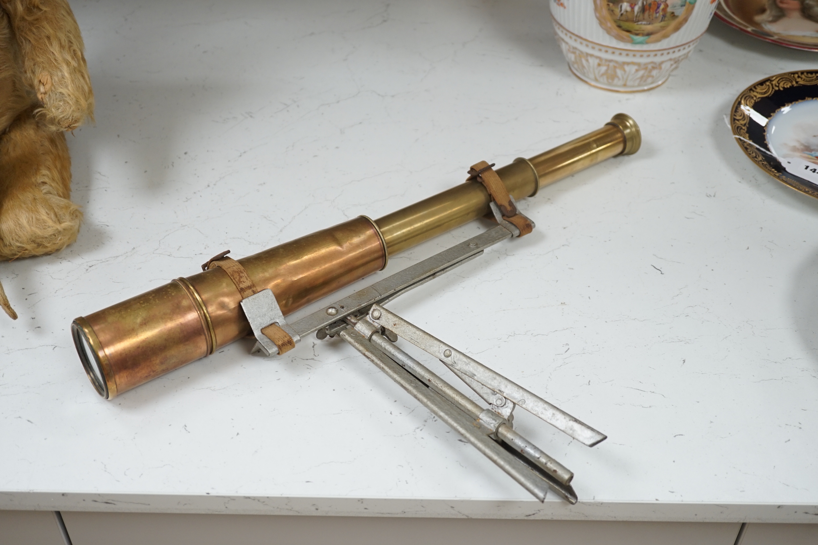 A brass single draw telescope, cased opera glasses, a pair of plated candlesticks, etc.